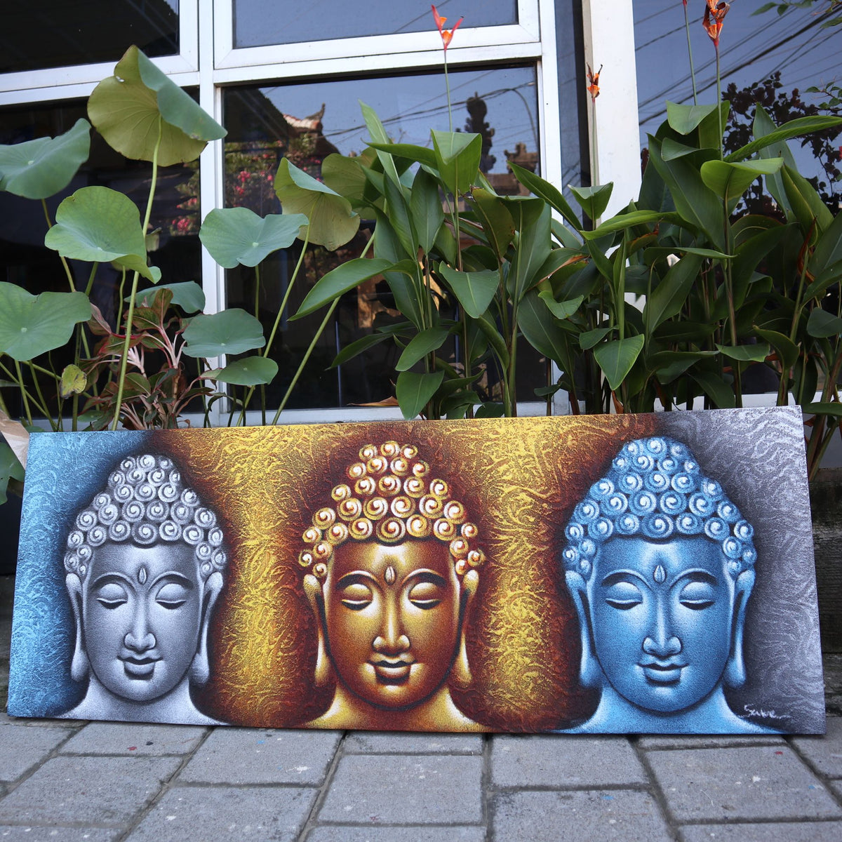 Peinture de Bouddha - Trois têtes avec détails dorés