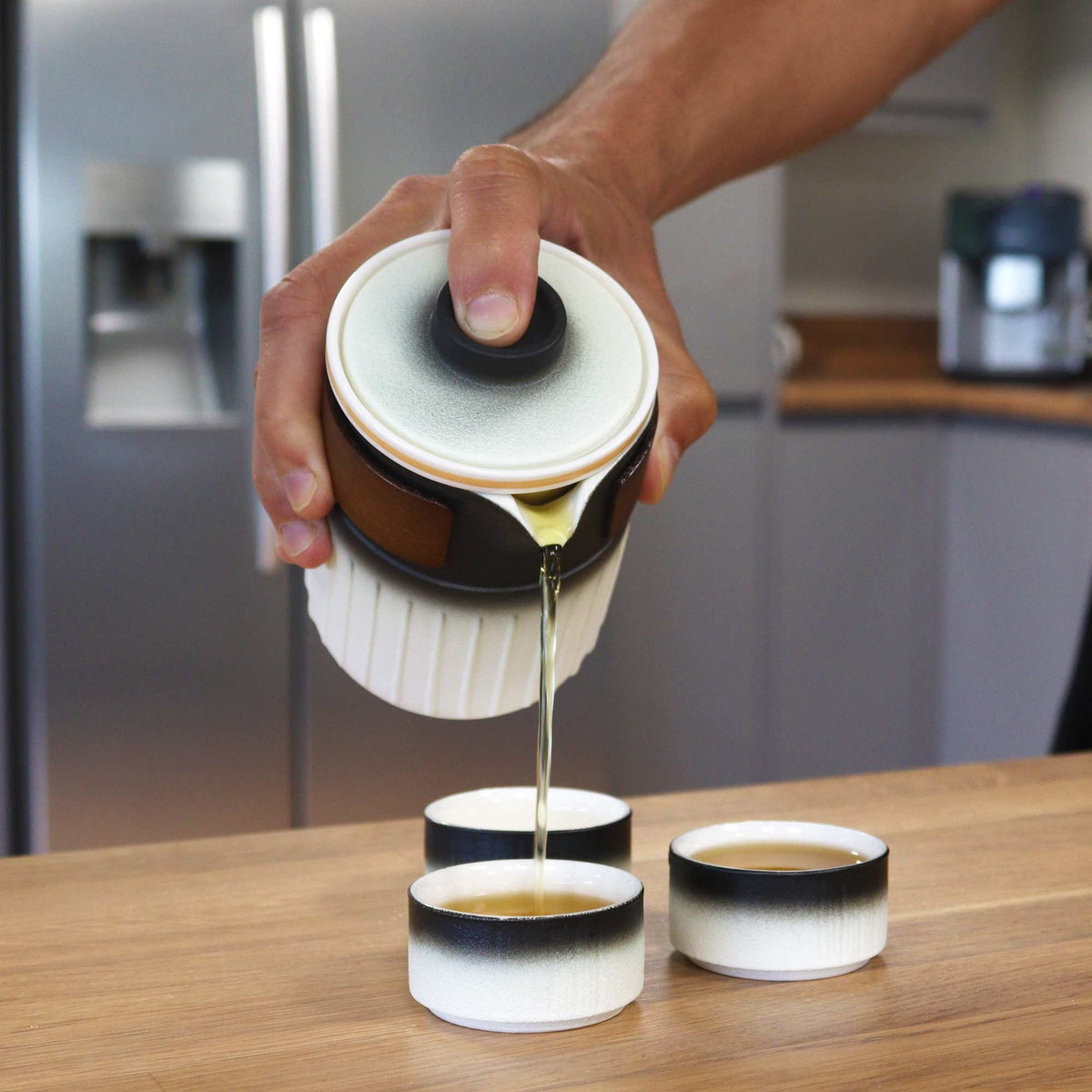 Service à thé « Trois Amis » : trois tasses et étui de voyage
