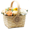 Bouquet dans un panier en osier - grande orange