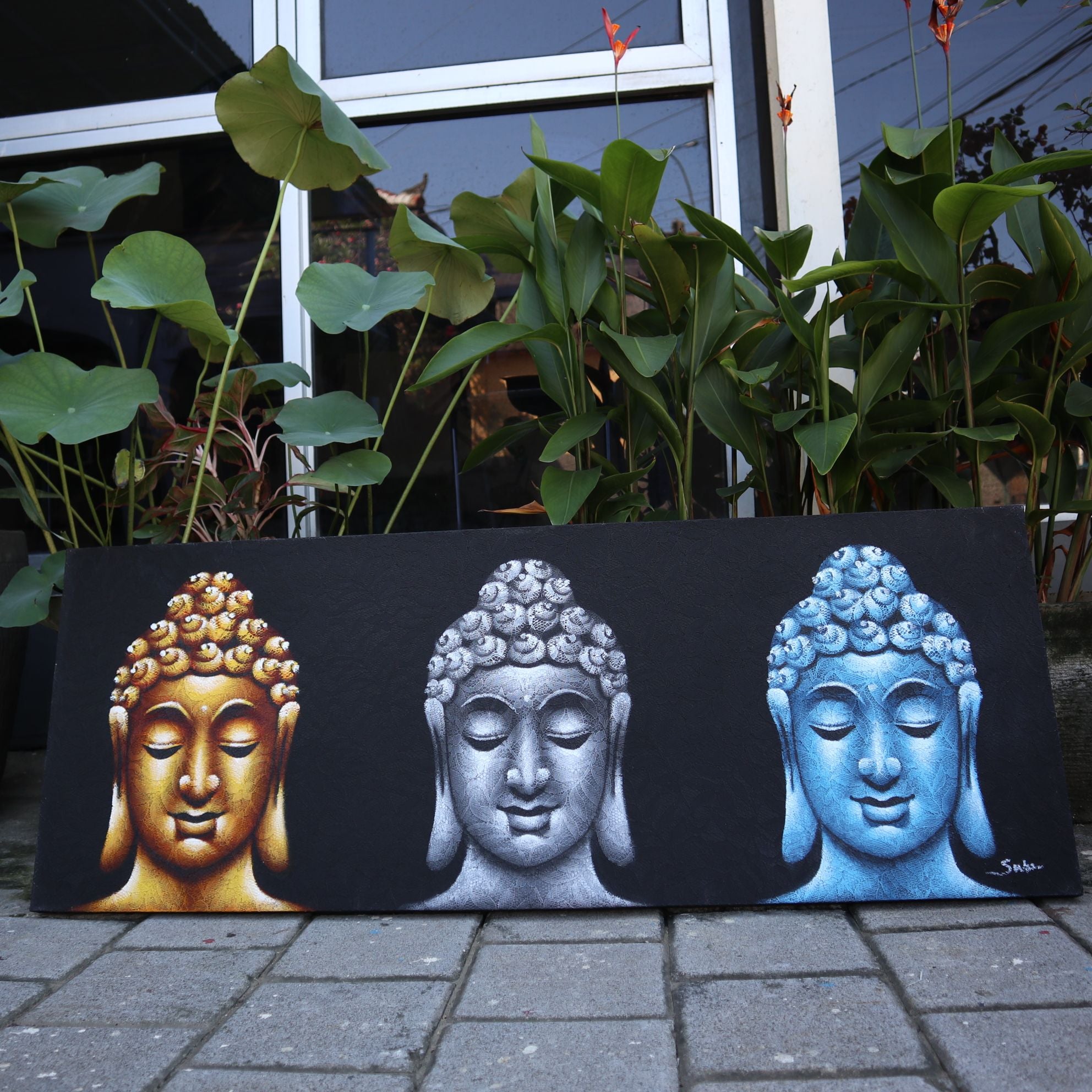 Peinture de Bouddha - Trois têtes noires
