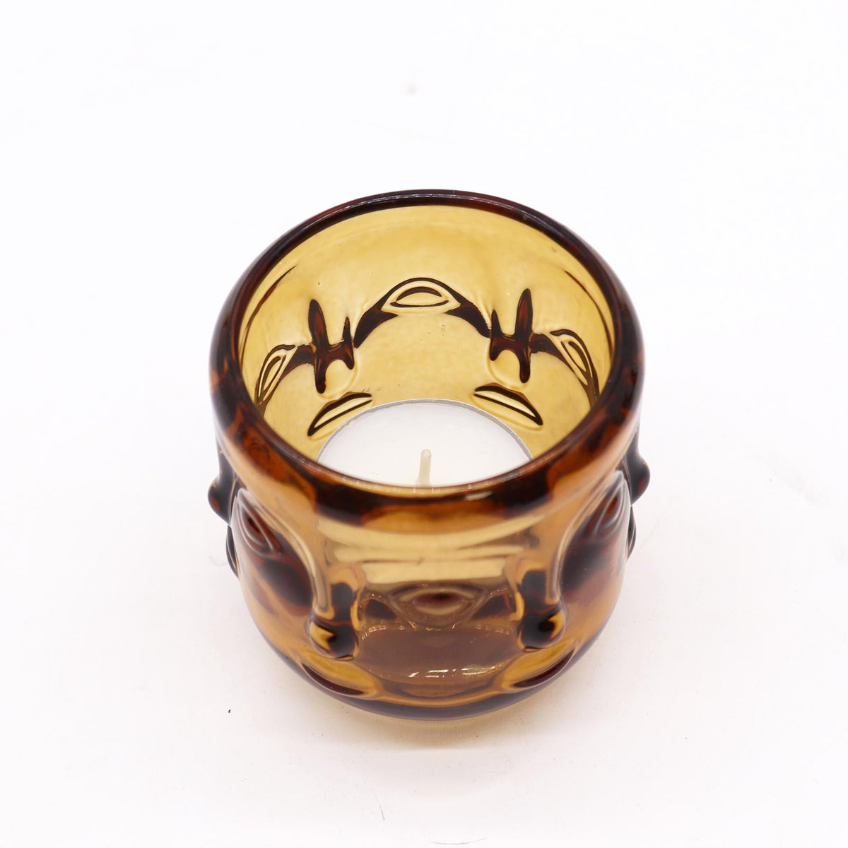Pot à bougie orné de visages de Bouddha - Ambre antique