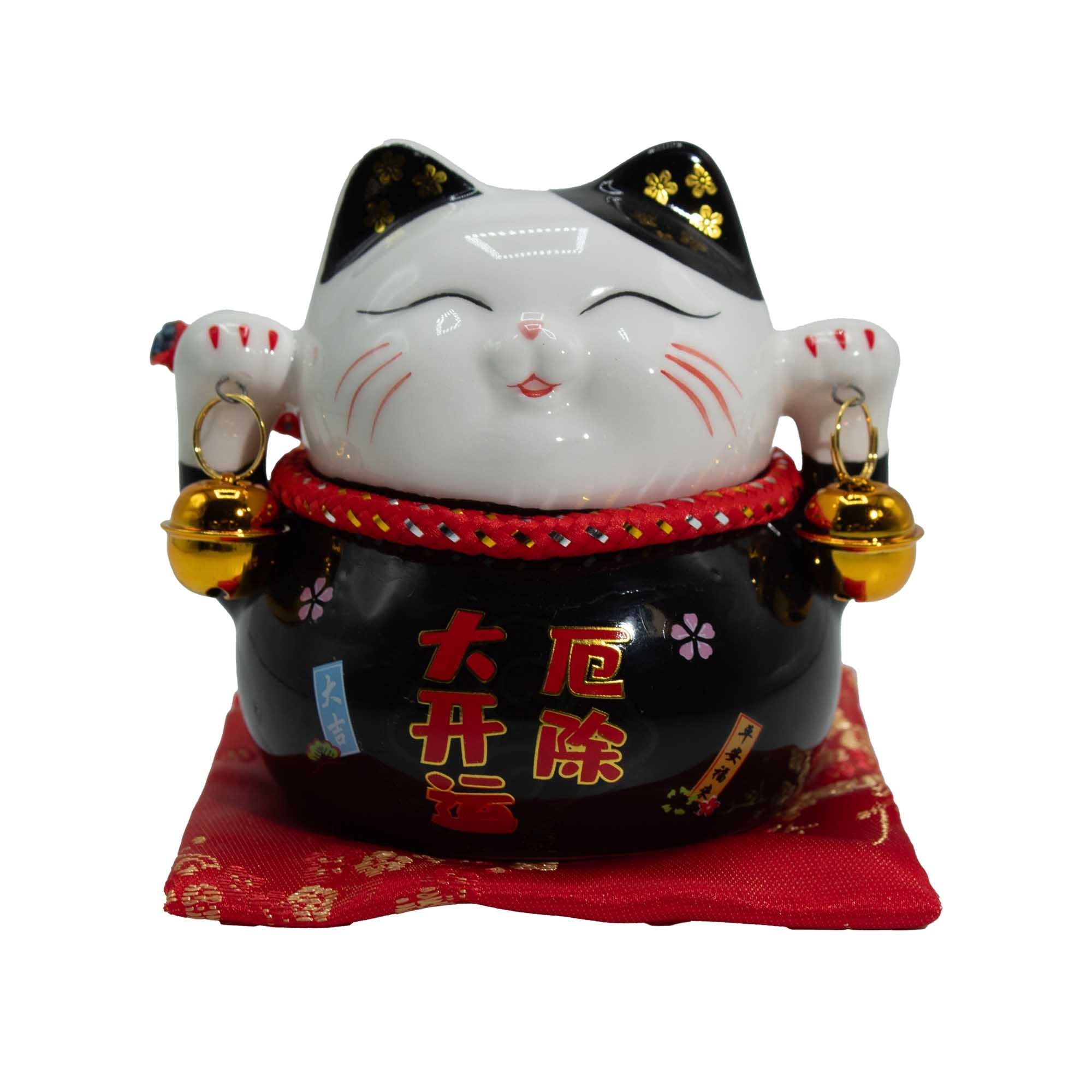Tirelire en céramique avec chat porte-bonheur - Noire sur coussin